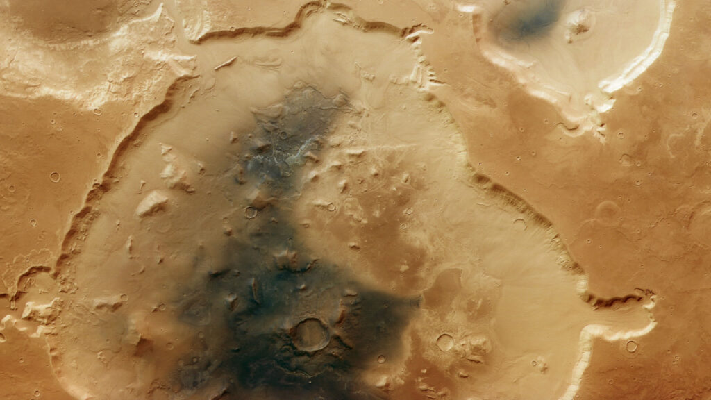 European Mars orbiter spies crumbling crater ‘soaked in layers of Martian history’ (photo)