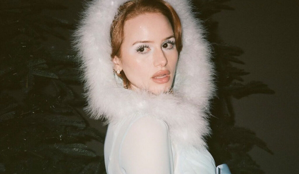 Madelaine Petsch Glows In Blue Fur-Trimmed Gown For Dreamy Christmas Shoot